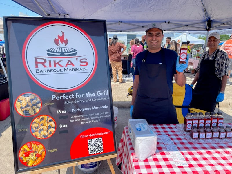 Rikas spicy Portuguese BBQ marinade sauce at a farmer's market.